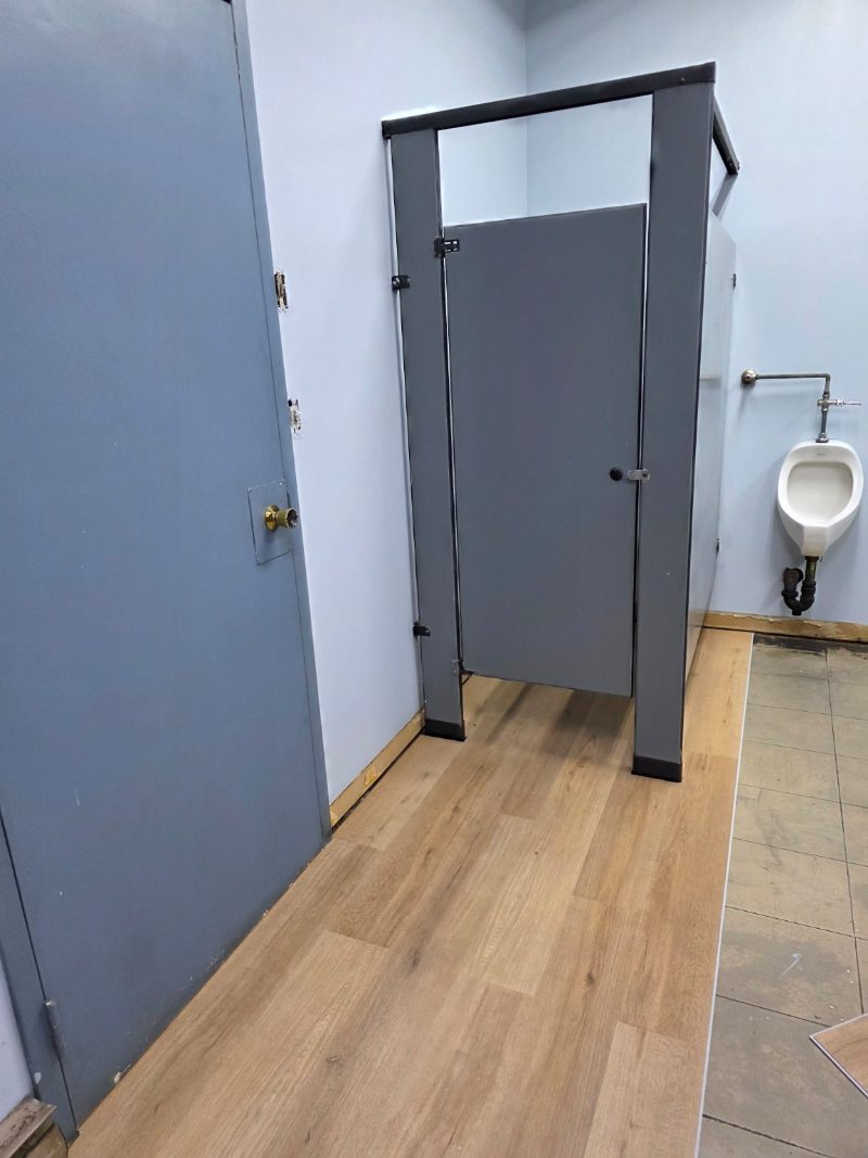 Completed restored charcoal steel washroom partition